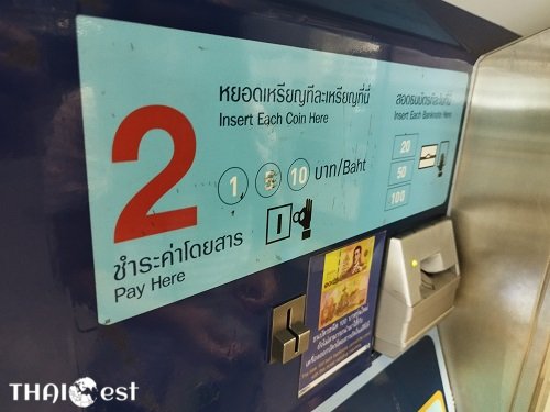 Insert Thai baht notes and coins